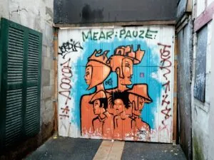 at the bottom of a narrow courtyard, between two buildings, 5 fetish characters, available in 3 colours, EXIST