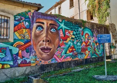 Street Art en Cévennes 13 Détail de la fresque Place du Souvenir : artistes Supo Caos, Isaac Barreda, Soukoz