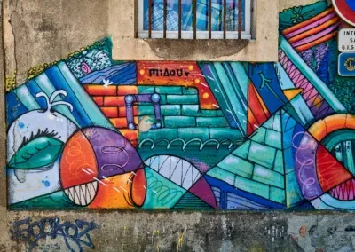 Street Art en Cévennes 16 Détail de la fresque Place du Souvenir : pour le MIAOU : artistes Supo Caos, Isaac Barreda, Soukoz