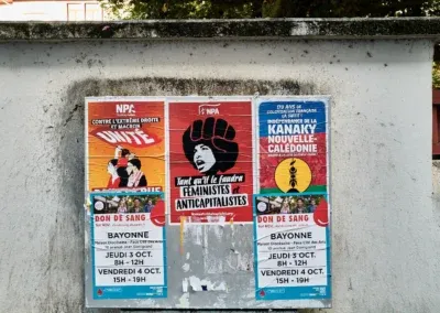 posters calling for resistance to capitalism, colonization in Kanaky and extreme need