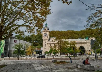 the station with its light yellow stone Belfry and its imposing clock